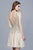 Shail K - 12182 Sleeveless V-Neckline Sequin Spangled Cocktail Dress in Gold