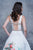 Nina Canacci - 1385 Plunging V-Neck Floral Accent Ballgown In White and Print