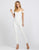 Ieena Duggal - 26141I Plunging Off-Shoulder Jumpsuit In White