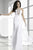 Janique K6045 - Long Empire Gown With Bejeweled Haltered Neckline And Ruched Bodice in White