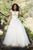 Jolene Collection - 18352 Sheer Bateau Neck A-line Gown In White and Multi-Color