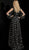 Jovani - 63582 Sheer Long Sleeve Bee Motif A-Line Gown in Black