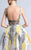 Beside Couture - BC1125D + CAGE Lace Appliqued Illusion Ballgown in White and Silver