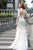 73073 Sheer Embellished Feathery Gown
