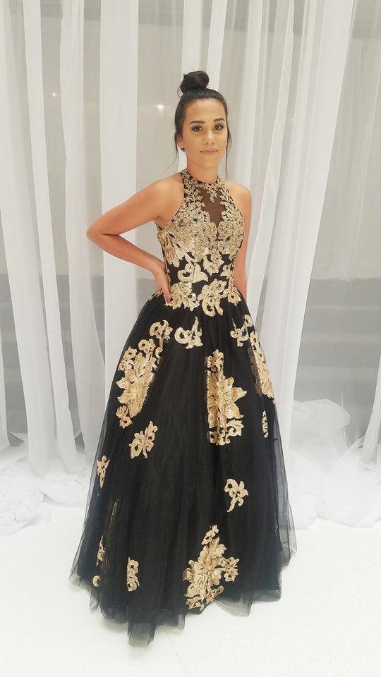 Dave & Johnny - A7936 Applique Halter Ballgown With Lace Up Back In Black and Gold
