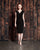 Alexander by Daymor - 869 Embellished Ruched V-neck Sheath Dress In Black