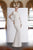 Janique - BSH-001 Bead-Draped Long Sleeve Sheath Gown In White