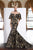 Janique - JA3013 Off-Shoulder Fitted Mermaid Gown In Black and Nude