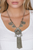 MEDALLION NECKLACE WITH FRINGE