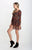 NOSTALGIC BLISS SKIRTED ROMPER