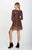 NOSTALGIC BLISS SKIRTED ROMPER