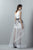 3354 Asymmetrical Appliqued Peplum Gown