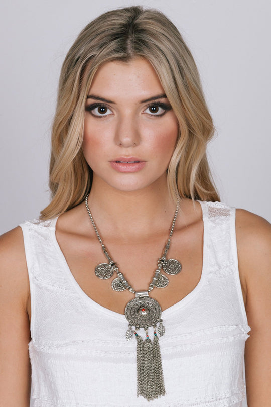 MEDALLION NECKLACE WITH FRINGE