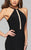 7899 Open back halter evening dress with illusion front and back with rhinestone detail.