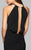 7899 Open back halter evening dress with illusion front and back with rhinestone detail.