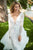 Sherri Hill - 52476 Applique Long Sleeve Deep V-neck Dress In White